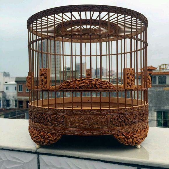 An exquisite Chinese bird cage with woodcarving